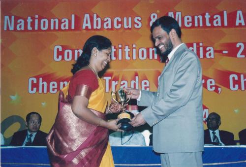 In the 4th National competition in the year 2004 Mrs Prameela receiving Best supporting Franchise from MD Mr Basheer Ahamed - Thej Academy